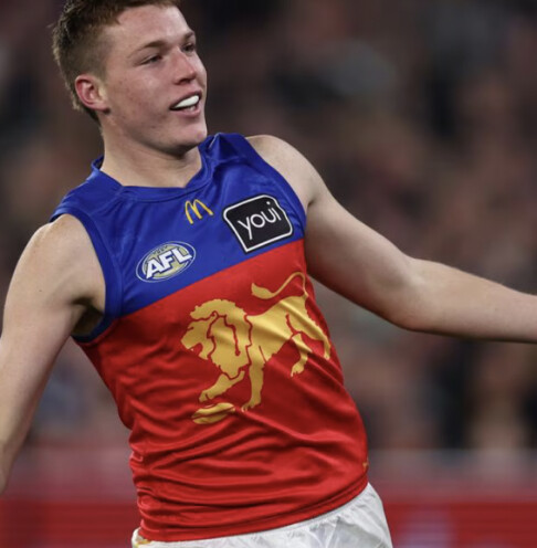Logan Morris celebrates one of his career-high eight goals as Brisbane ran over Collingwood at the MCG